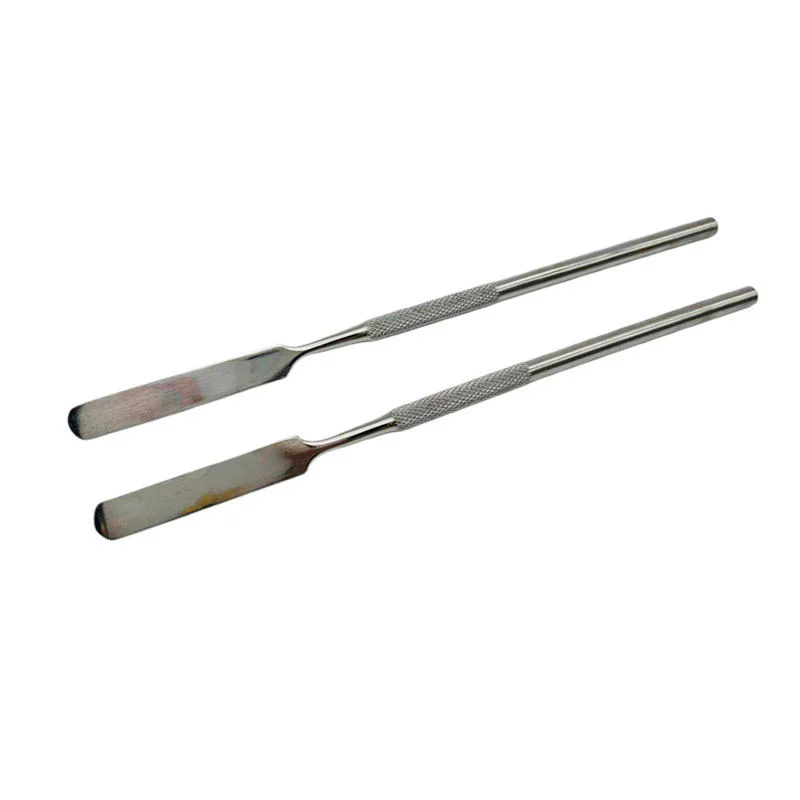 Flat laboratory spatula on white background